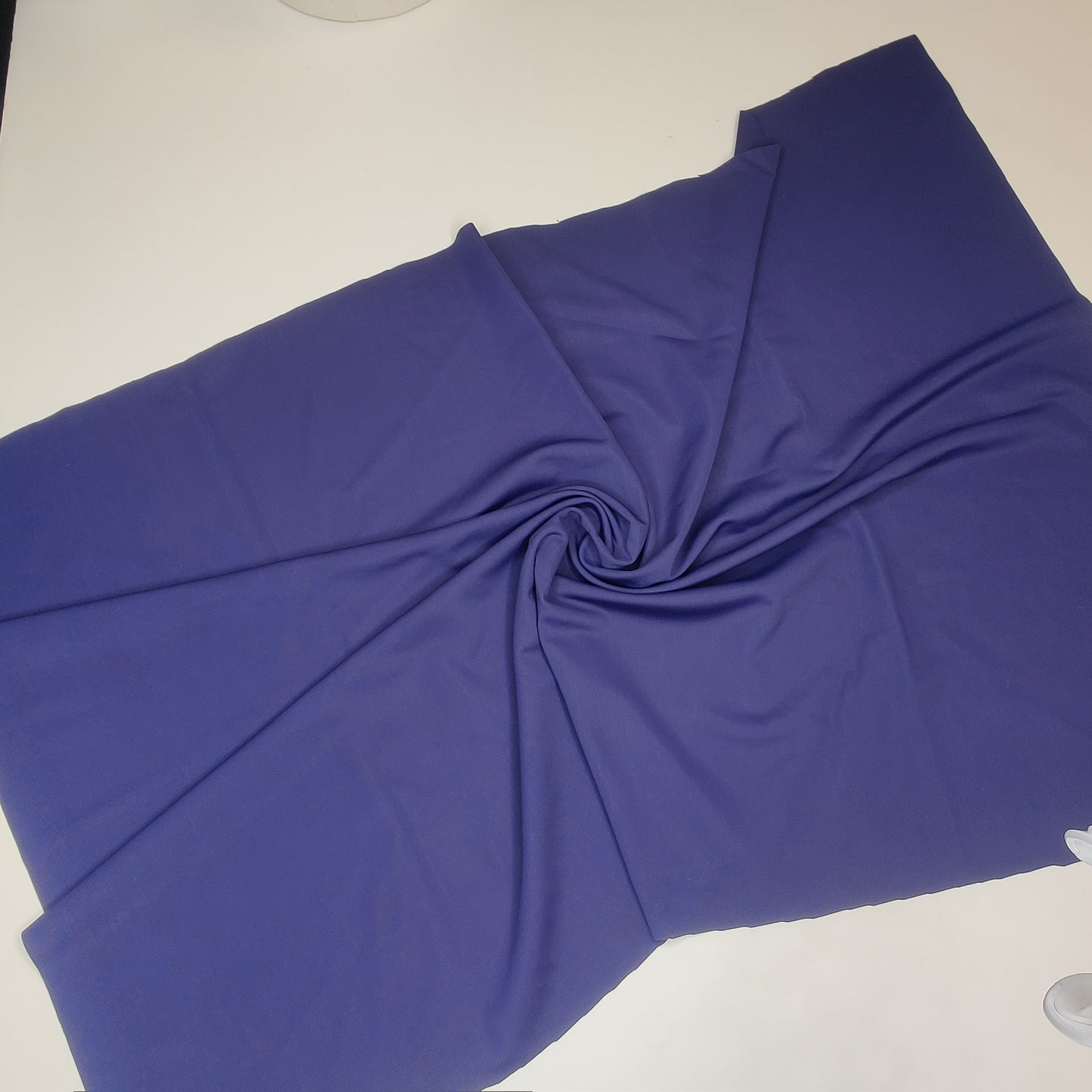 Microfiber, bi-elastic laundry fabric. Color direction midnight blue
