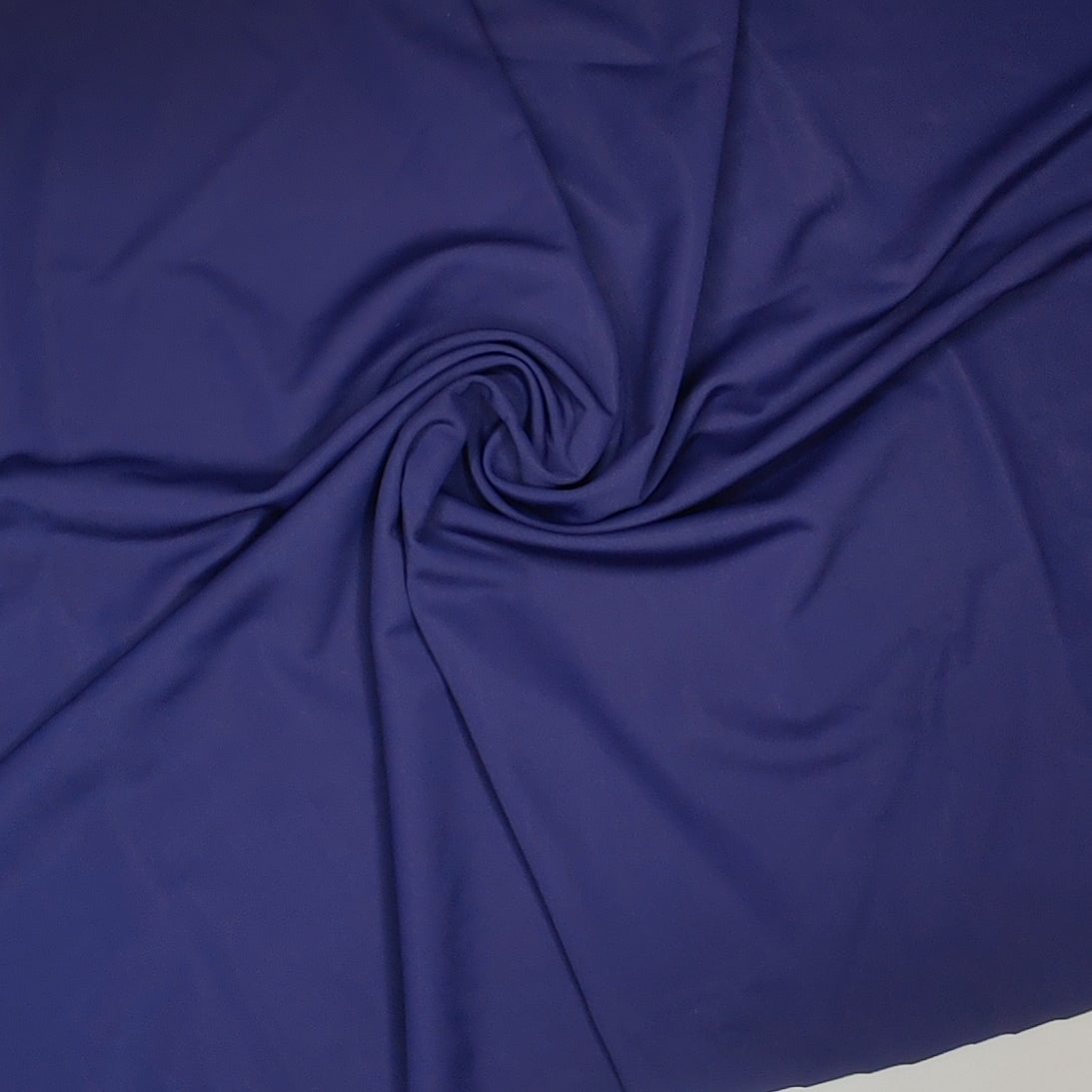 Microfiber, bi-elastic laundry fabric. Color direction midnight blue